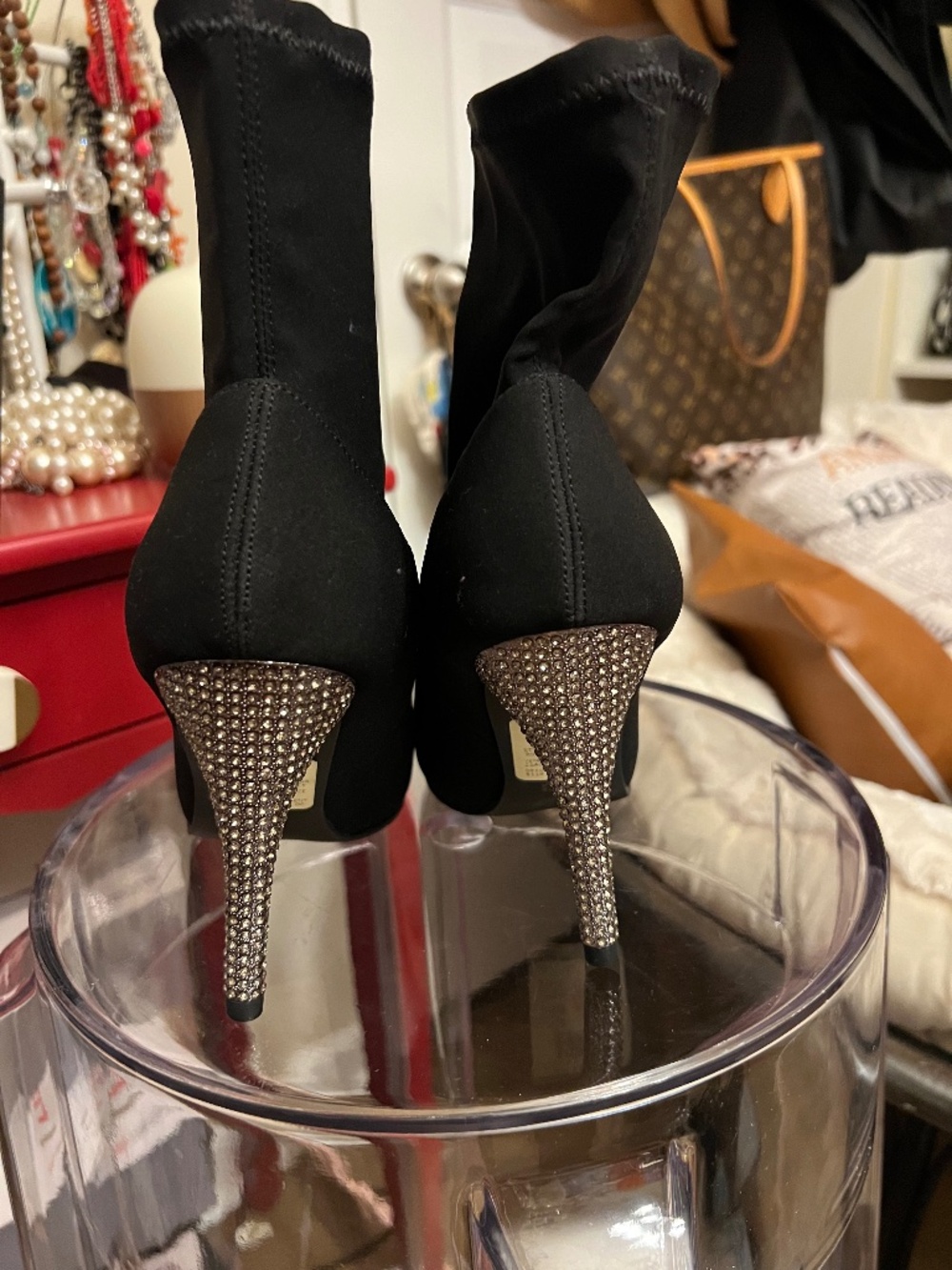 Von Maur stunning black short boot with a diamond cluster heel.